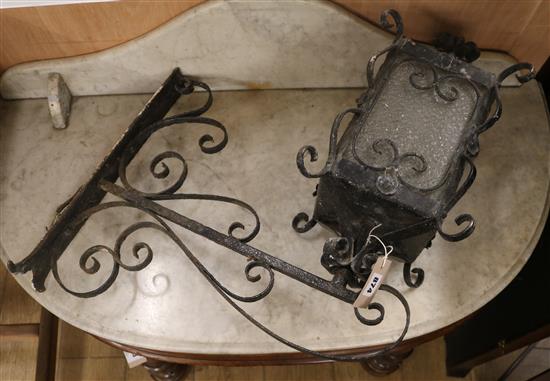 A wrought iron lantern W.22cm